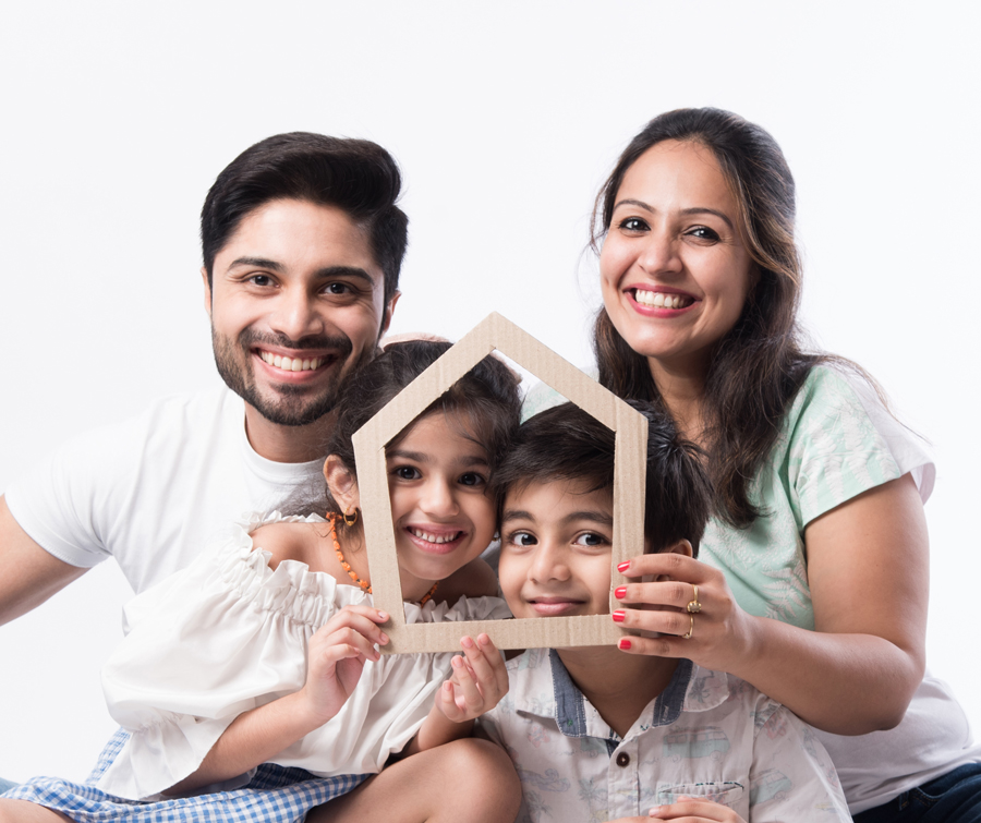 indian-family-father-mother-son-daughter-holding-3d-paper-model-home-real-istate-concept-india2